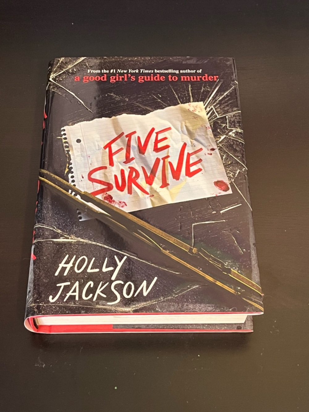 Five Survive by Holly Jackson - Black & Red Hardcover book